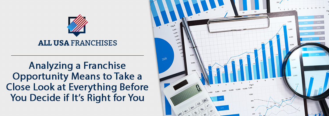 Franchise Information Charts and a Magnifying Glass to Analyze Franchise Opportunity