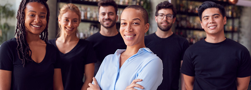 Six Franchise Business Owners Smiling Because They Found and Purchased a Successful Franchise