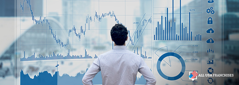 People Staring At Chart Trying To Figure Out What Percentage of Franchises Are Successful