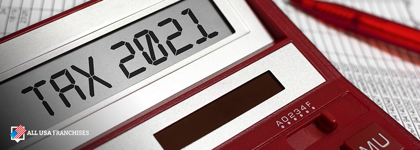 Red Calculator That Reads Tax 2020 on Its Screen