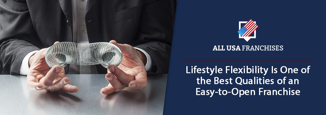 Businessman Holding a Slinky in His Hands