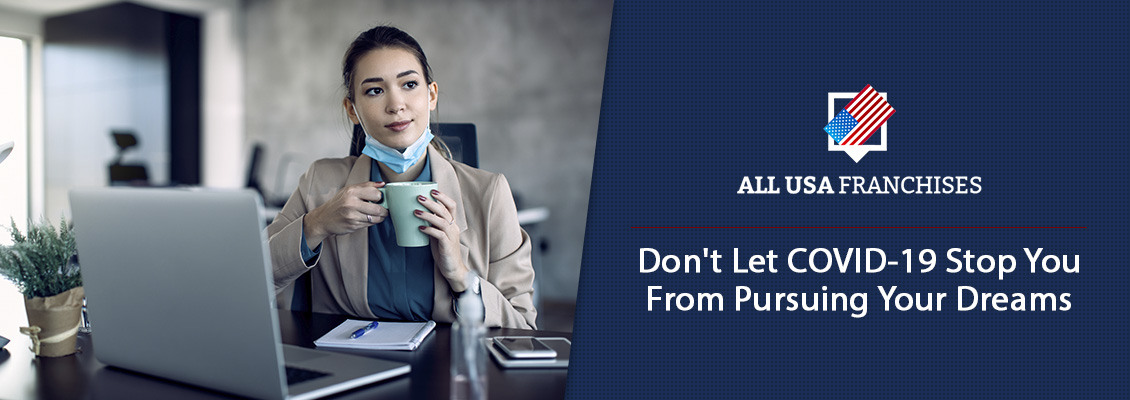 Businesswomen Drinking Coffee With Laptop in Front of Her