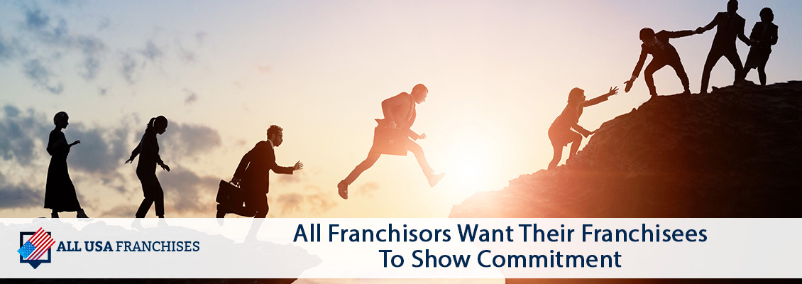 Franchisees Clearing a Gap Between Two Ledges Representing Their Commitment to Their Franchisors