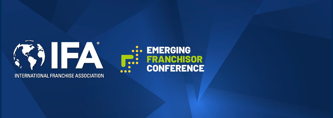 The International Franchise Association Logo With a Background of Colored Cubes